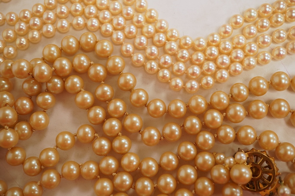 Two cultured pearl necklaces, each composed of a single row of cultured pearls, one with pearls 3-7mm diameter, length 44cm, clasp stamped 9CT; the other with pearls approximately 6mm diameter, length 86cm, clasp with Br